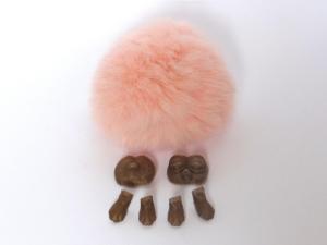 Pieces of the pygmy puff with a fur ball